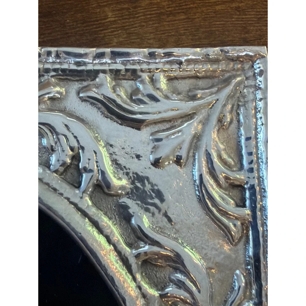 Vintage Ornate Silver Embossed Picture Frame Oval Opening Scrollwork Tabletop